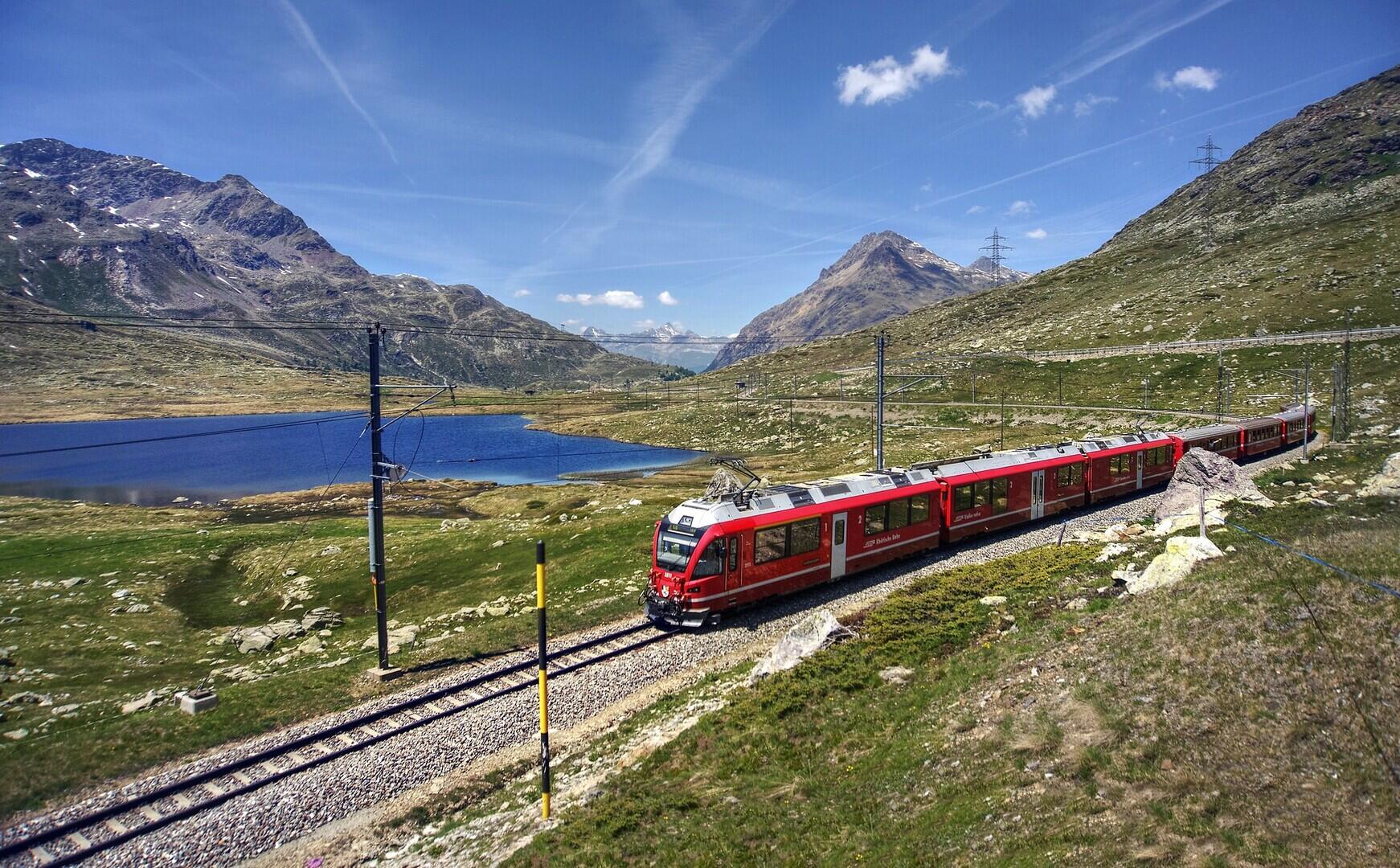 Swiss Alpine Train through Mountain Landscape